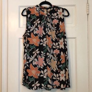 Sleeveless swing top